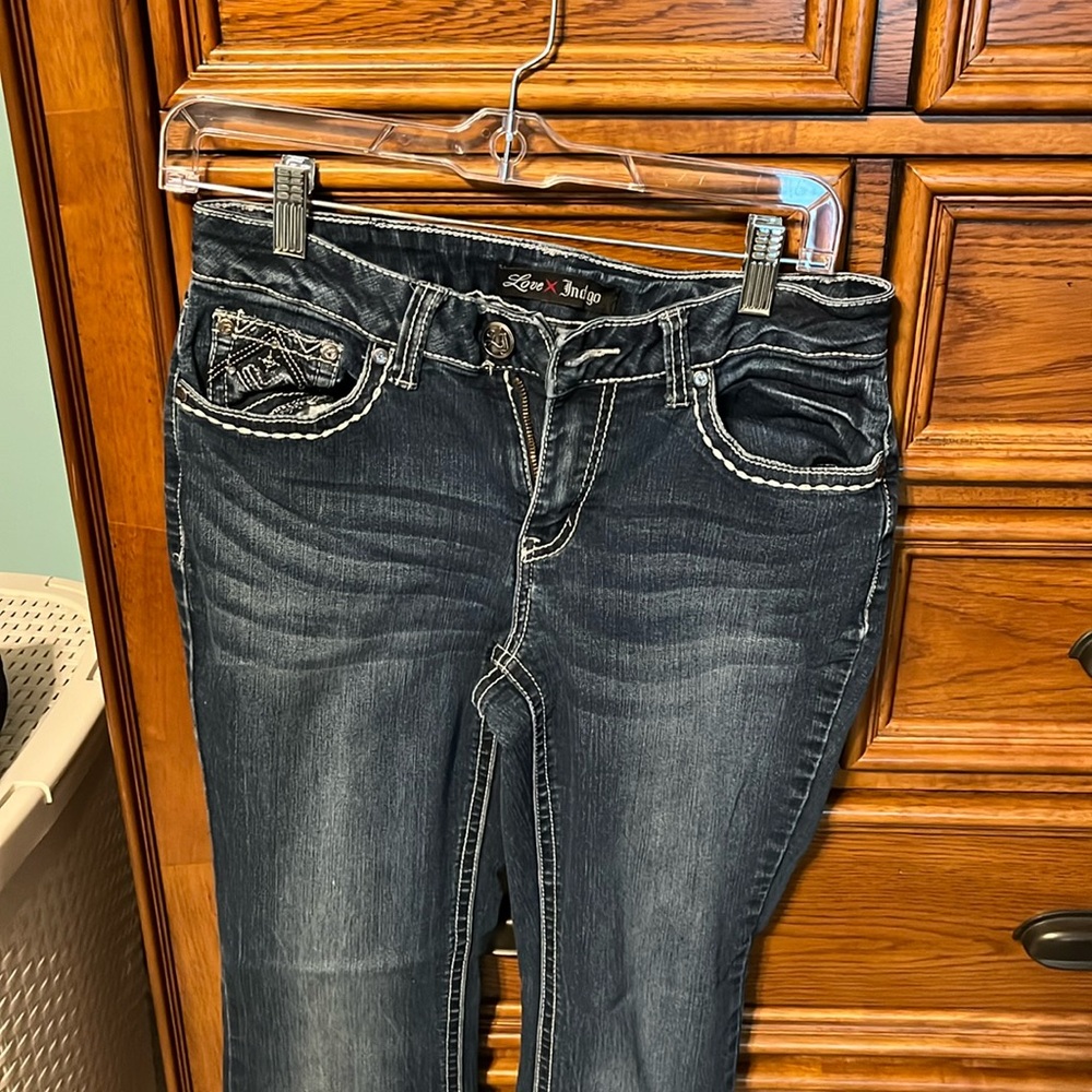 Women’s jeans. Waist 15”, inseam 29”.